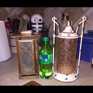 2 separate glass lanterns
